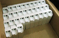 Plastic parts being packaged for shipment